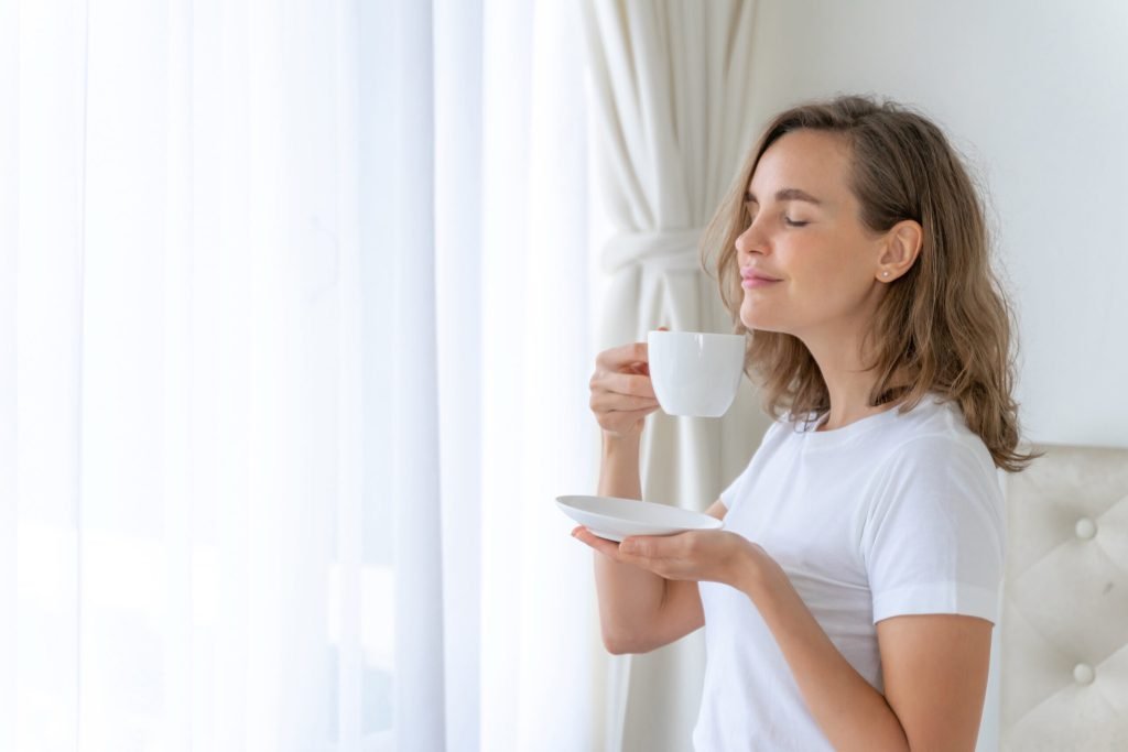 Beautiful beauty woman cute girl feel happy drinking coffee morning