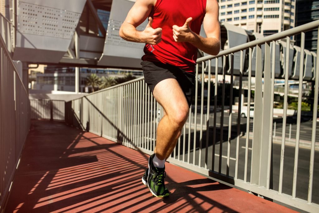 Runner red t shirt showes thumbs up move