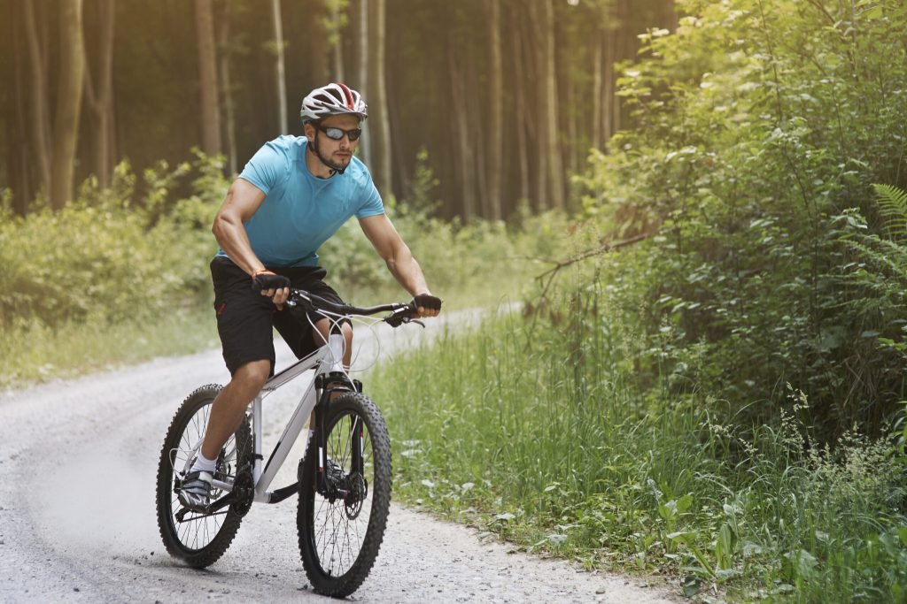 Pensive man riding down hill