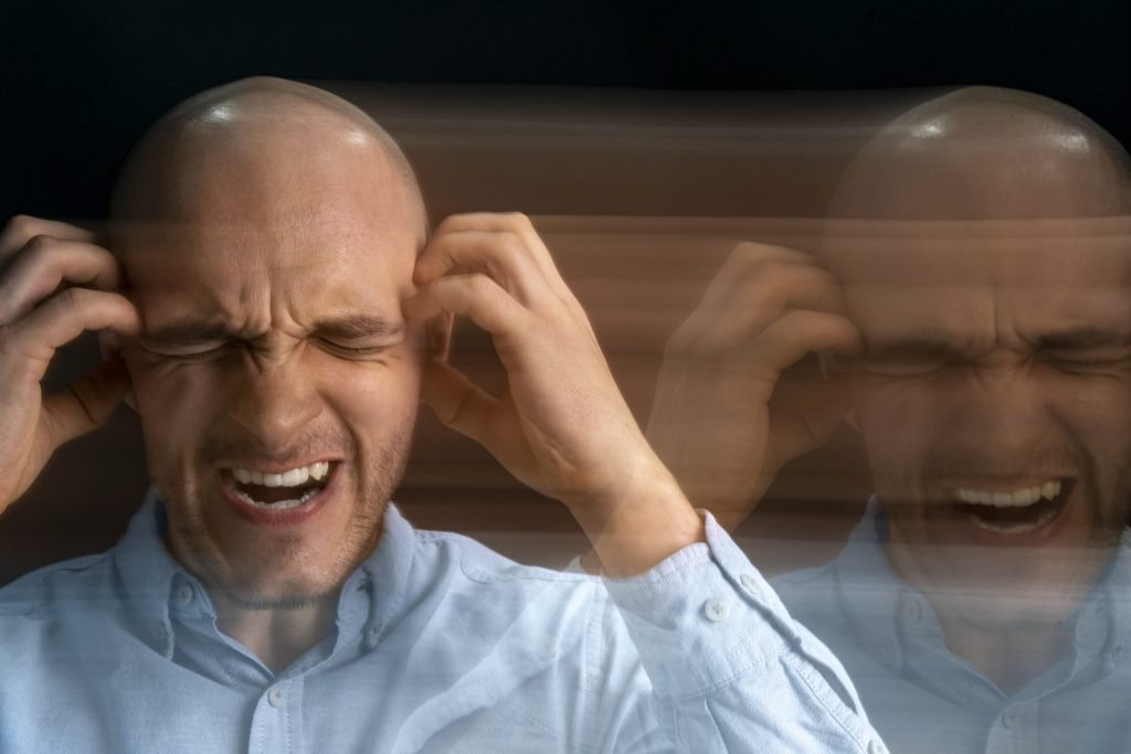 Portrait man suffering from schizophrenia