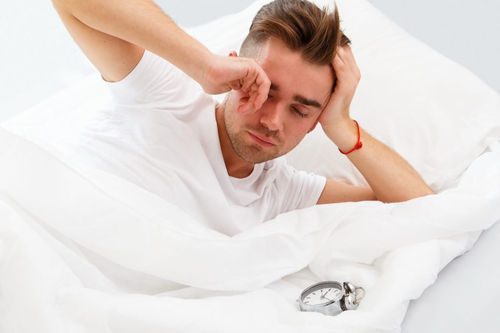 Young man bed