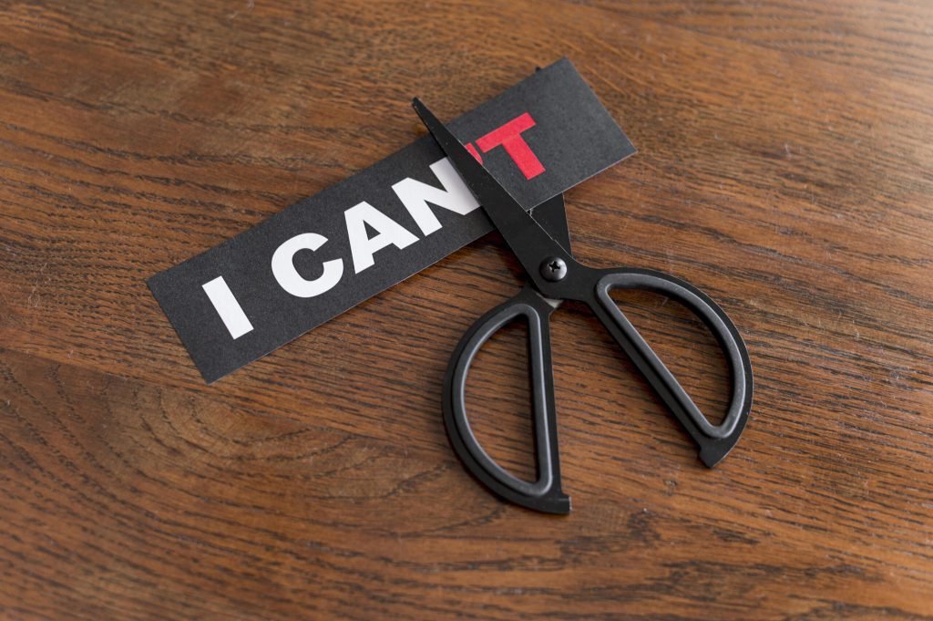 Top view i cant message card being cut with scissor