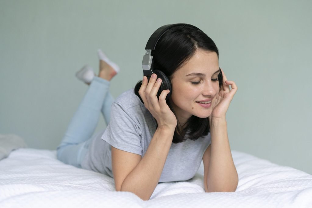 Young woman listening music home