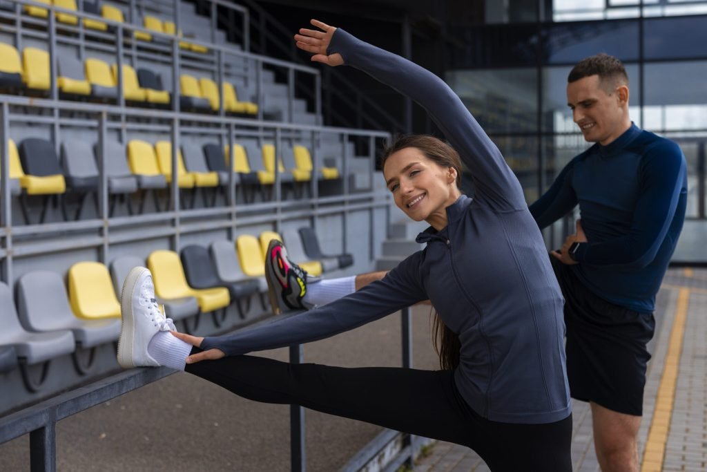 Front view couple doing workout exercises