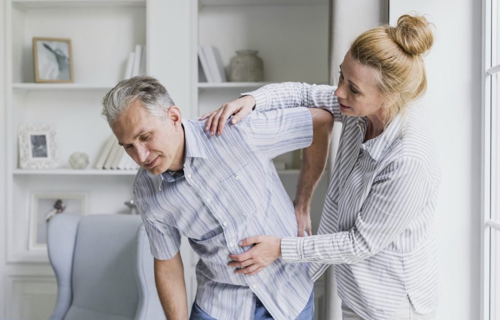 Front view woman man with back pain
