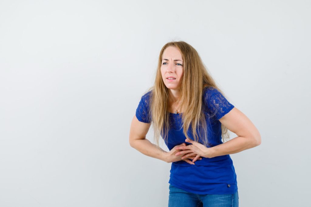 Expressive young woman posing studio