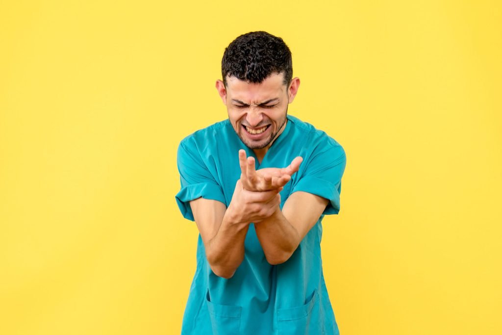 Side view doctor doctor talks what if your hand hurts