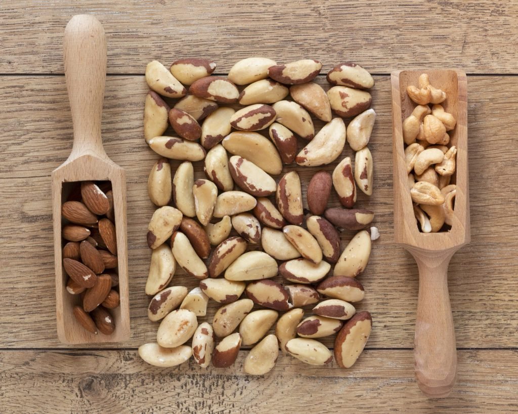 Close up view nuts arrangement wooden table