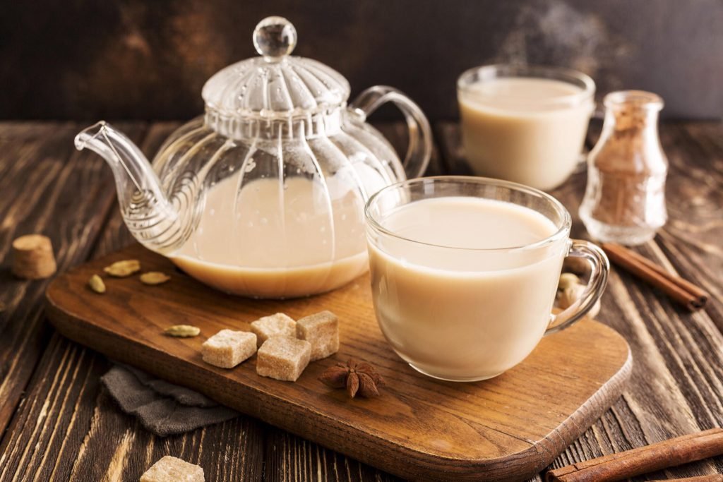 Front view milk tea concept with cinnamon