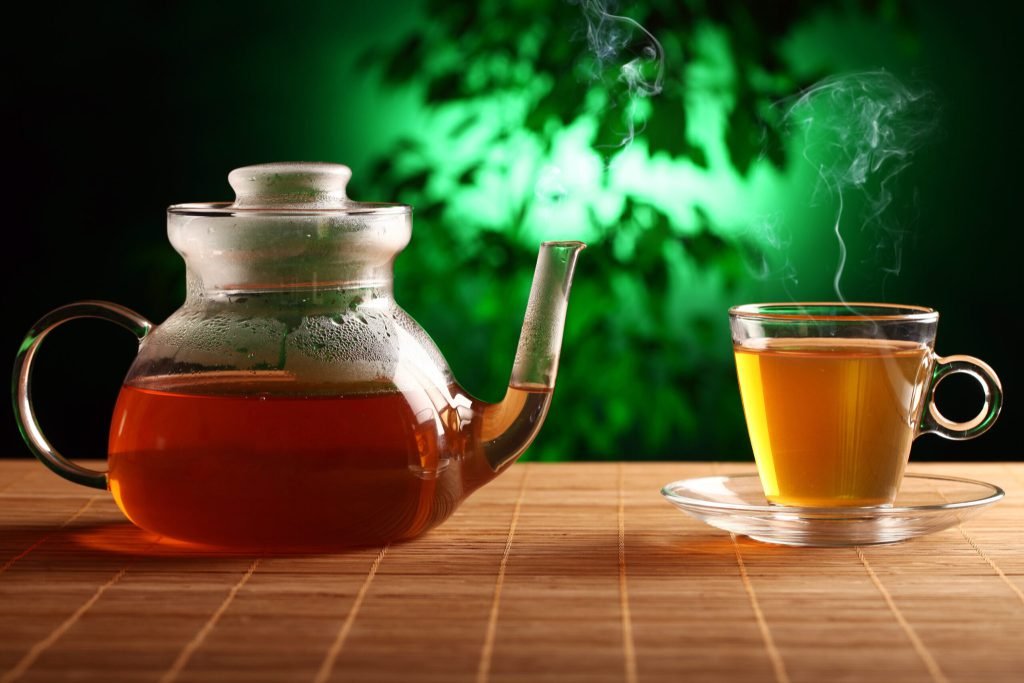 Hot green tea glass teapot cup