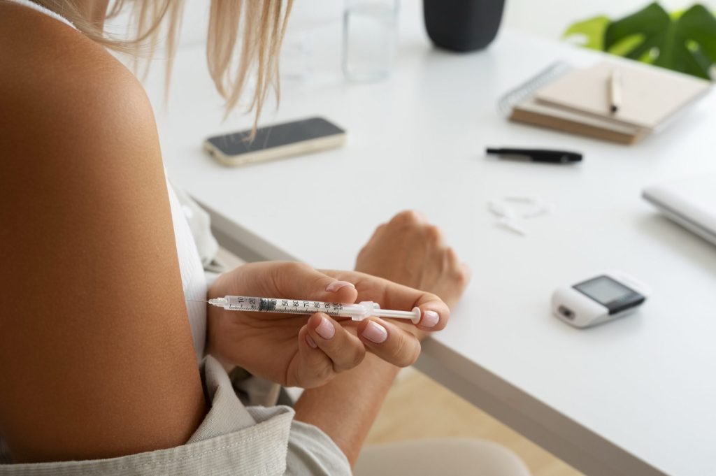 Diabetic person checking their glucose level