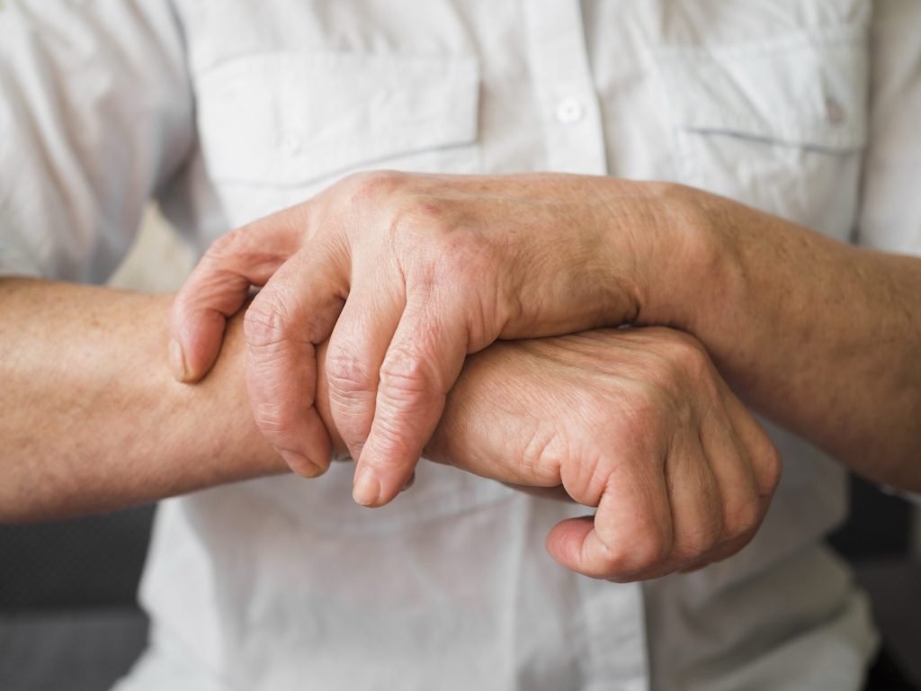 Close up old patient with wrist issues