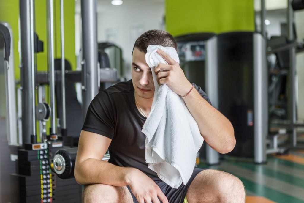 Healthy man training gym