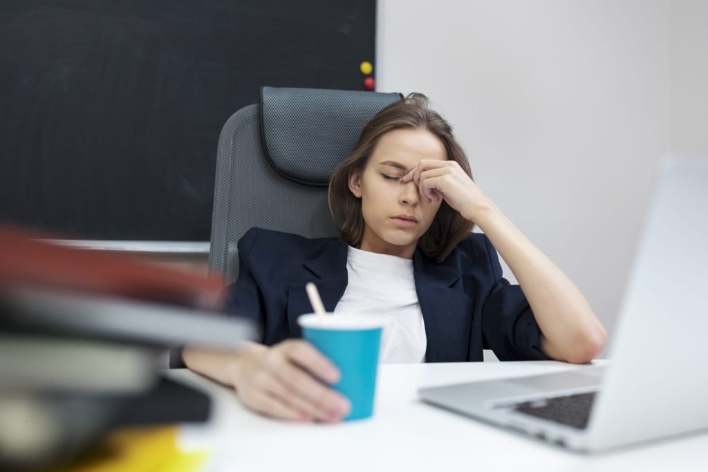 Medium shot tired woman office