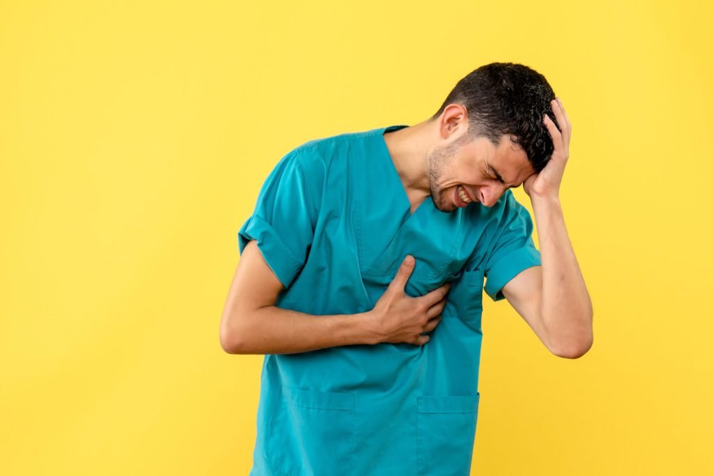 Side view specialist doctor tells what if you have heartache headache