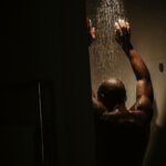 What is ‘Dark Showering’ and Can It Really Help You Sleep Better?