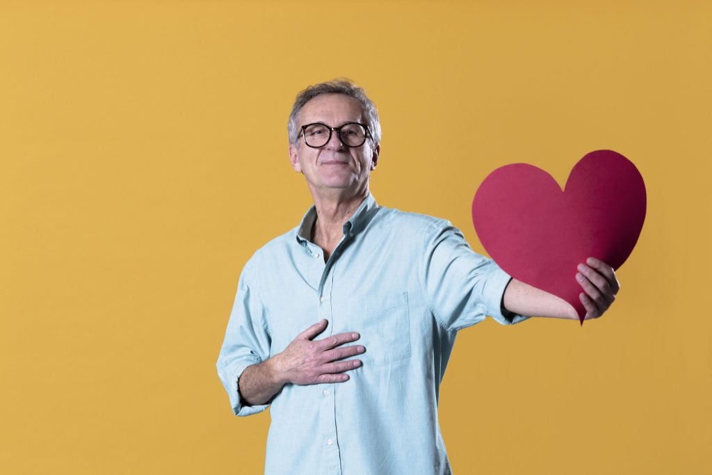 Man with heart hand