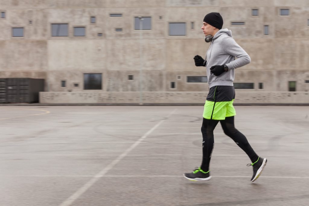 Athlete running urban environment